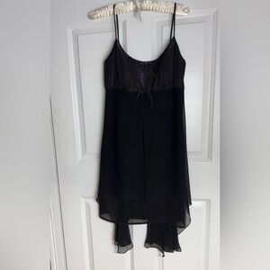 Stylish Black Sleeveless Dress with Shimmering Detail